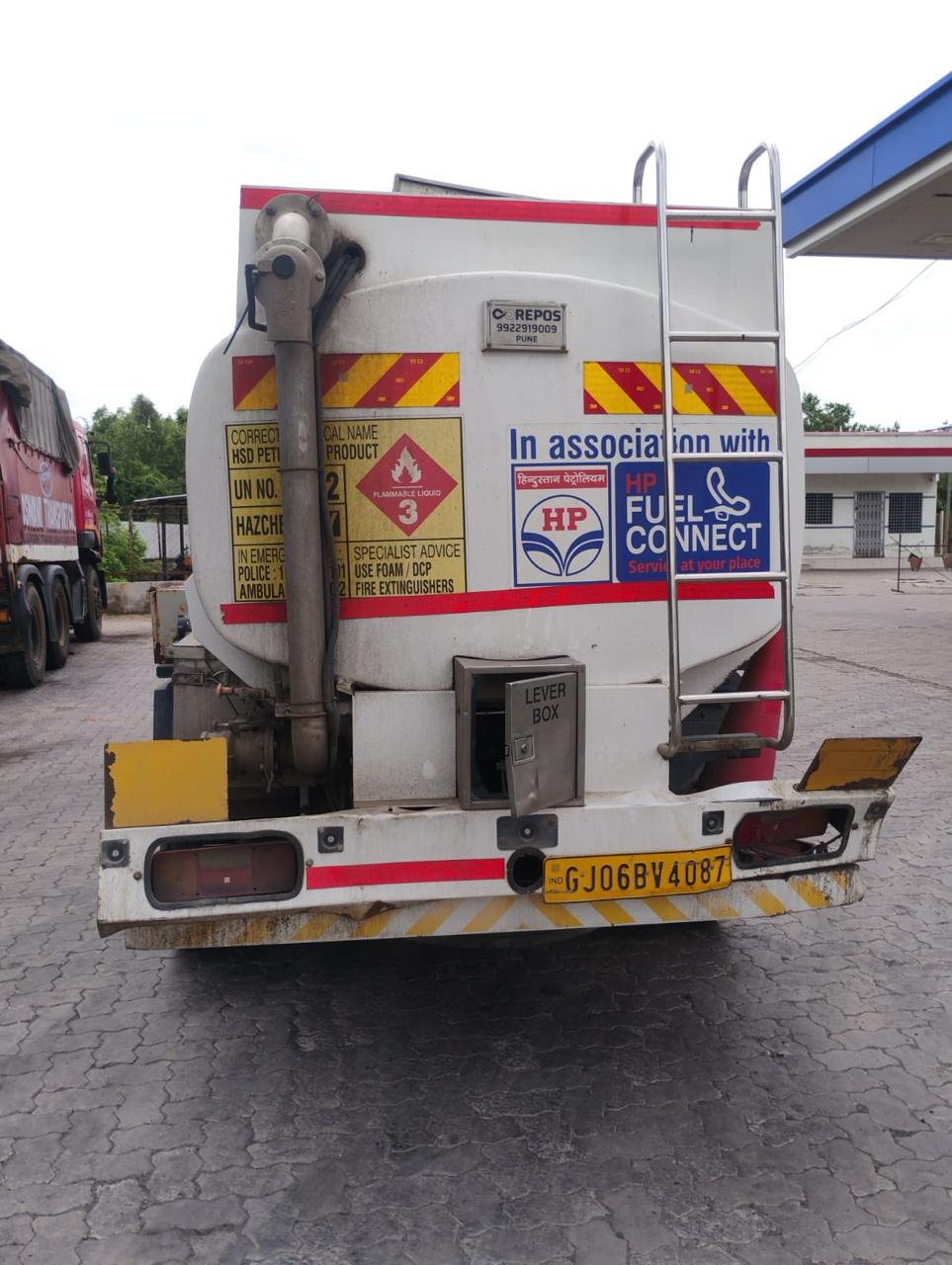 Rear view of a Repos and HP Fuel Connect delivery vehicle